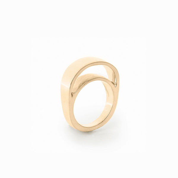 Gold Barrel Ring by Elke Van Dyke is a 4K gold-plated sculptural silver ring with undulating curves. Discover the Core Collection.