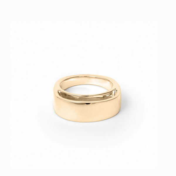 Gold Barrel Ring by Elke Van Dyke is a 4K gold-plated sculptural silver ring with undulating curves. Discover the Core Collection.
