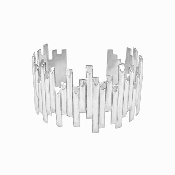 Wide Basalt Cuff Bracelet in sterling silver with offset design, inspired by Iceland’s Vik Beach and handcrafted by Elke Van Dyke. Front view.