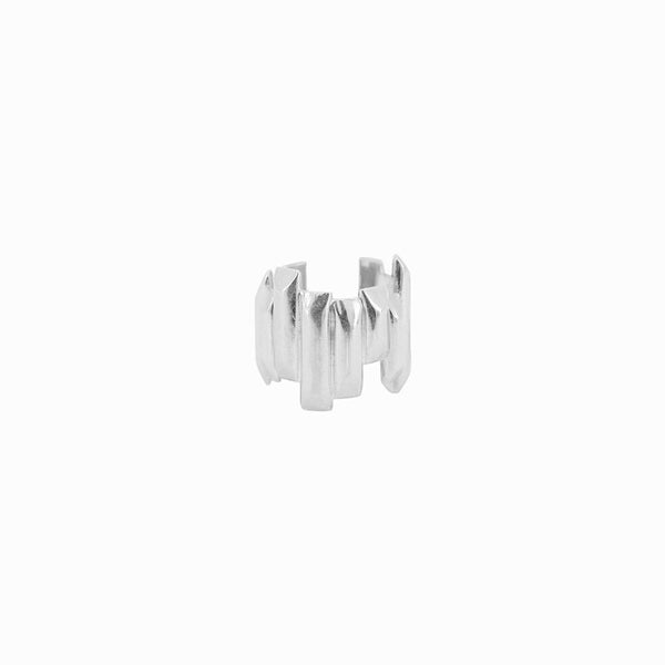 Basalt Ear Cuff in sterling silver, asymmetric design inspired by Icelandic volcanic rock formations. Handcrafted by Elke Van Dyke.