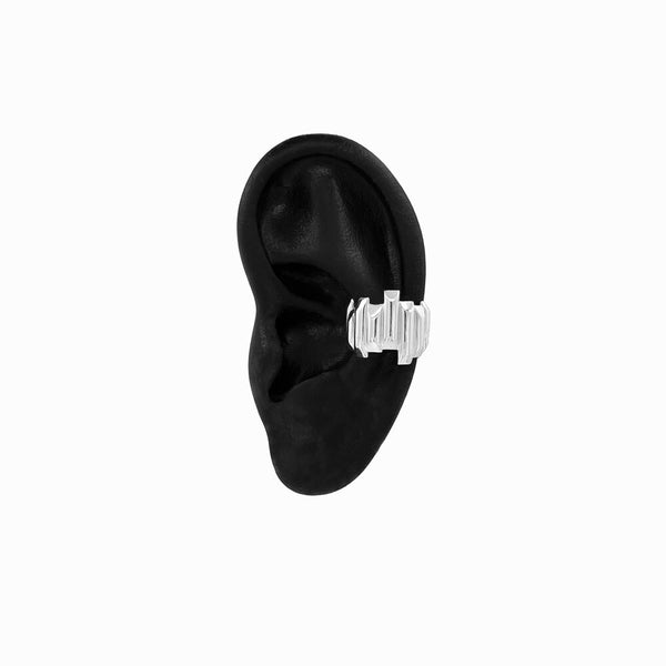 Basalt Ear Cuff in sterling silver, asymmetric design inspired by Icelandic volcanic rock formations. Handcrafted by Elke Van Dyke.