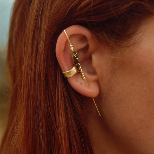 Gold Cocoon Ear Pin by Elke Van Dyke – handcrafted14K gold fill and faceted hematite stones. Available in 7cm and 8cm lengths.