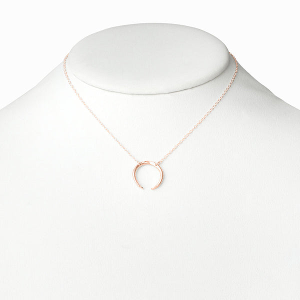 Rose Gold Crescent Moon Necklace by Elke Van Dyke – handcrafted 14k gold vermeil pendant with minimalist lunar design.