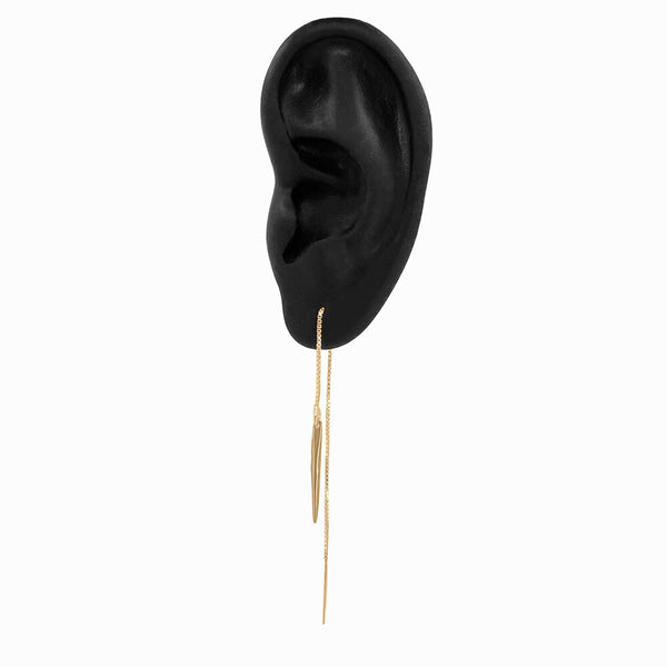 Elke Van Dyke Gold Icicle Threader Earrings on display ear – handcrafted minimalist design in 14k gold vermeil, inspired by winter’s elegance.