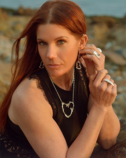 Handcrafted sterling silver Portugal Heart Necklace – elegant jewelry by Elke Van Dyke. Inspired by Portugal’s coastline.