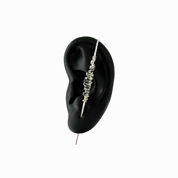 Silver Cocoon Ear Pin by Elke Van Dyke – handcrafted sterling silver and faceted hematite stones. Available in 7cm and 8cm lengths.