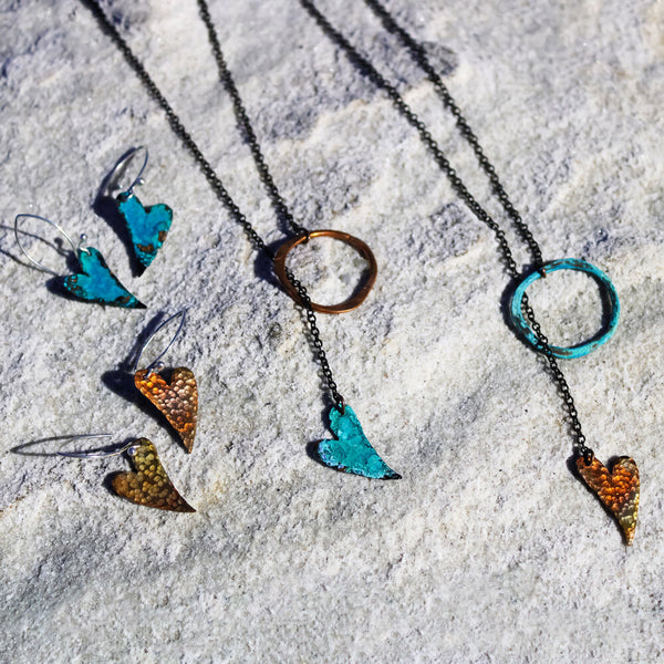Flame Heart Earrings by Elke Van Dyke—handcrafted flame-oxidized copper hearts with sterling silver hooks.
