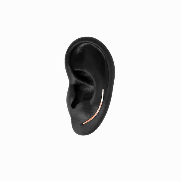 Elke Van Dyke Design image of the Ear Climber in Rose Gold on mannequin ear
