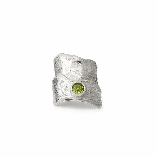 Elke Van Dyke Design Glacier Peridot Ring front view, one-of-a-kind sculptural jewelry, handcrafted in sterling silver.