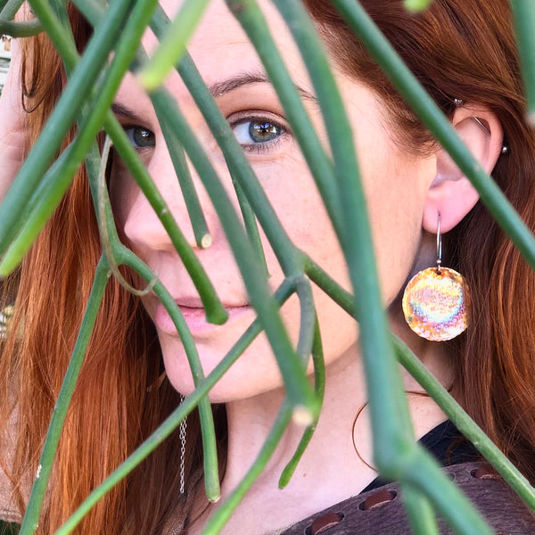 Large Copper Sol Earrings—handcrafted in copper and silver with turquoise patina. Sculptural and bold Seascape design by Elke Van Dyke.