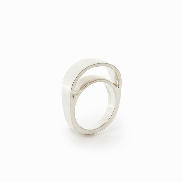 Barrel Ring hand crafted by Elke Van Dyke - a sculptural sterling silver ring inspired by rolling waves. Bold and minimalist.