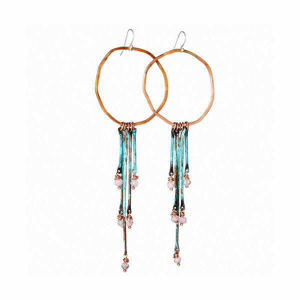 Riviera Earrings by Elke Van Dyke—handcrafted copper and silver dangles with faceted amethyst and turquoise patina.