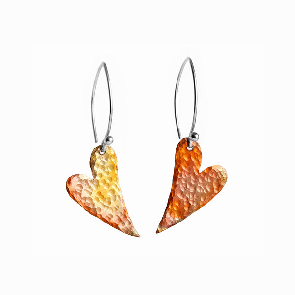 Flame Heart Earrings by Elke Van Dyke—handcrafted flame-oxidized copper hearts with sterling silver hooks.