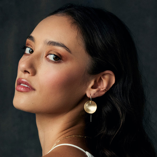 Elke Van Dyke Design Gold Moon Earrings, handcrafted concave design in 14K gold fill and sterling silver. Brushed finish.