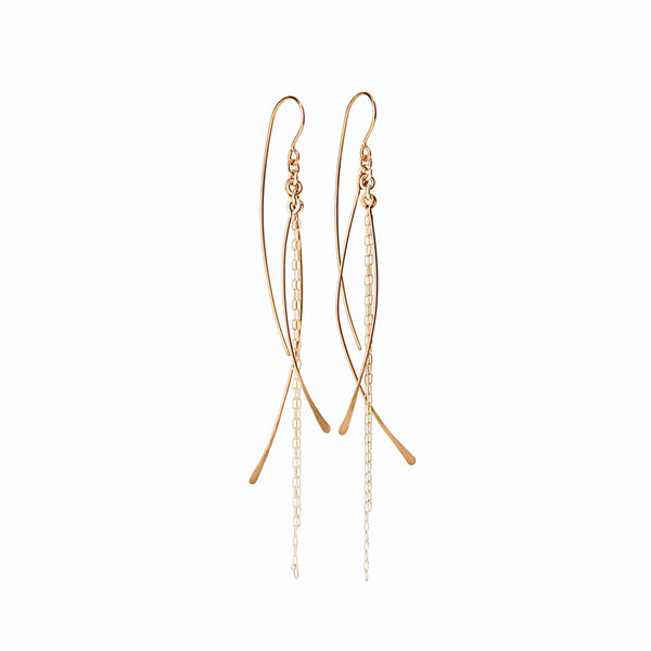 Gold and silver dangle earrings with cascading chain design, handcrafted by Elke Van Dyke. Lightweight, sculptural, and richly textured.