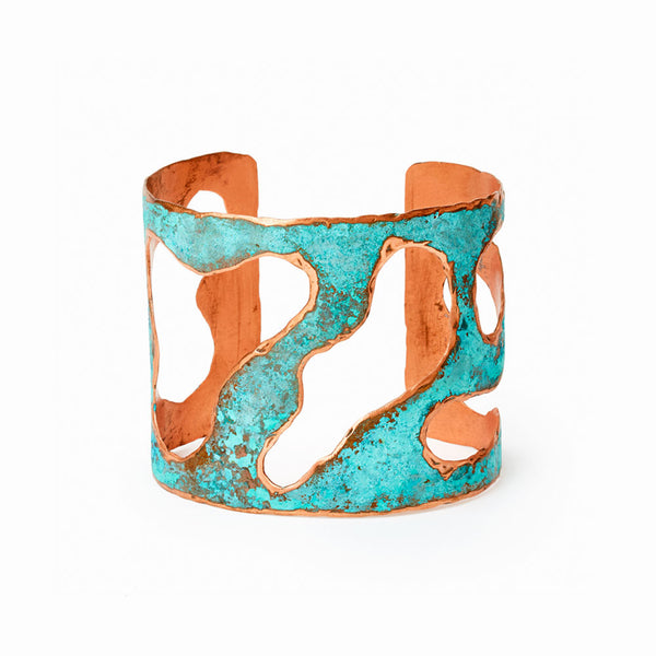 Lake Cuff Bracelet by Elke Van Dyke , a 2-inch turquoise patina copper cuff with sculptural cut-out forms. Individually handcrafted.