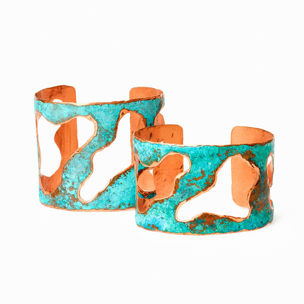 Lake Cuff Bracelet 1.5" width by Elke Van Dyke. A turquoise patina copper cuff with sculptural cut-out island forms. Individually handcrafted.