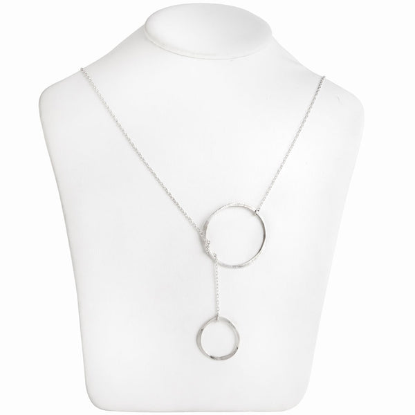 Orbit Lariat Necklace in sterling silver -cascading Y‑chain form, handcrafted for lightweight sculptural elegance by Elke Van Dyke.