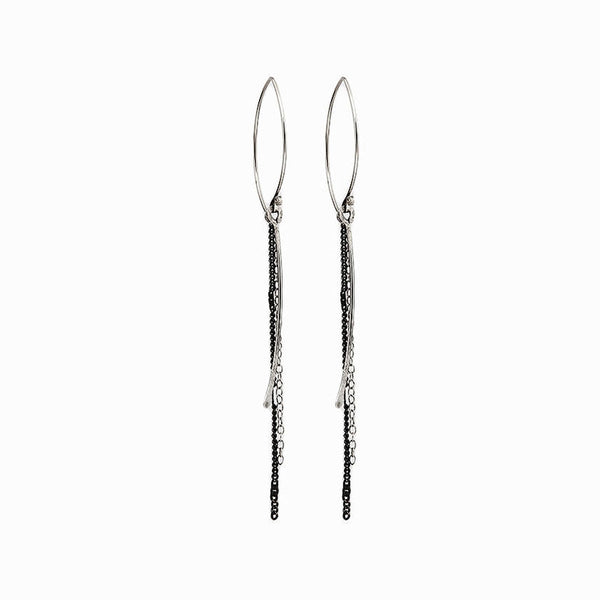 Ripple Waterfall Earrings with cascading chain design. Handmade in sterling silver with sculptural, lightweight movement by Elke Van Dyke.