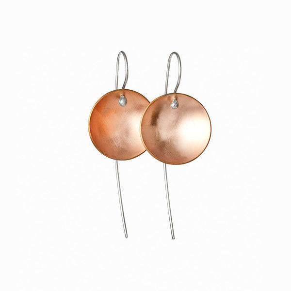 Rose gold moon earrings – minimalist handcrafted celestial jewelry by Elke Van Dyke with an organic, lunar-inspired glow. Concave design. Brushed finish. 14K Rose gold fill and sterling silver.