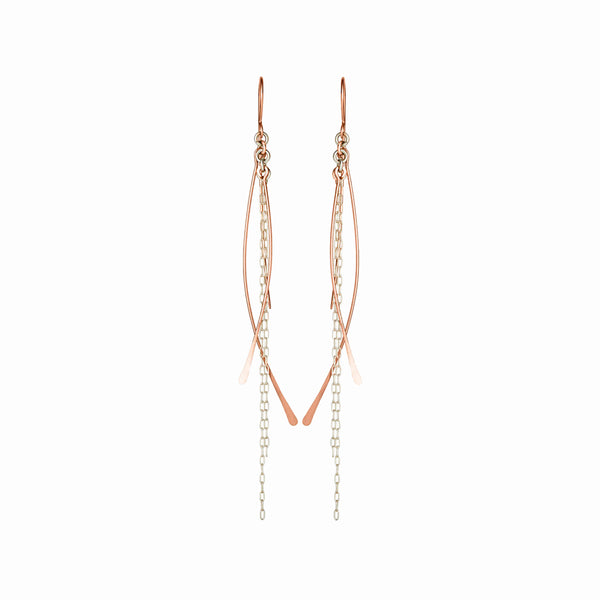 Handcrafted 14K rose gold and sterling silver waterfall chain earrings with sculptural movement. Lightweight and elegant, handmade jewelry by Elke Van Dyke.