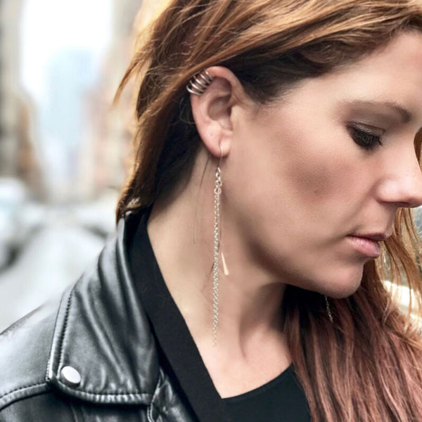 Handcrafted 14K rose gold and sterling silver waterfall chain earrings with sculptural movement. Lightweight and elegant, handmade jewelry by Elke Van Dyke.