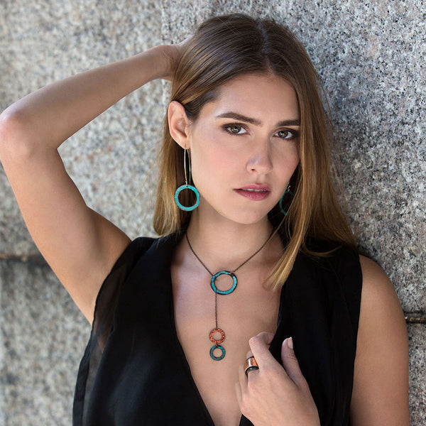 Seascape Turquoise Earrings by Elke Van Dyke. Handcrafted patina copper halos with sterling silver hooks.