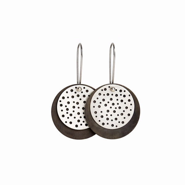 Elke Van Dyke's Silver Eclipse Drop Earrings – handcrafted juxtaposing brushed and oxidized sterling silver inspired by celestial textures.