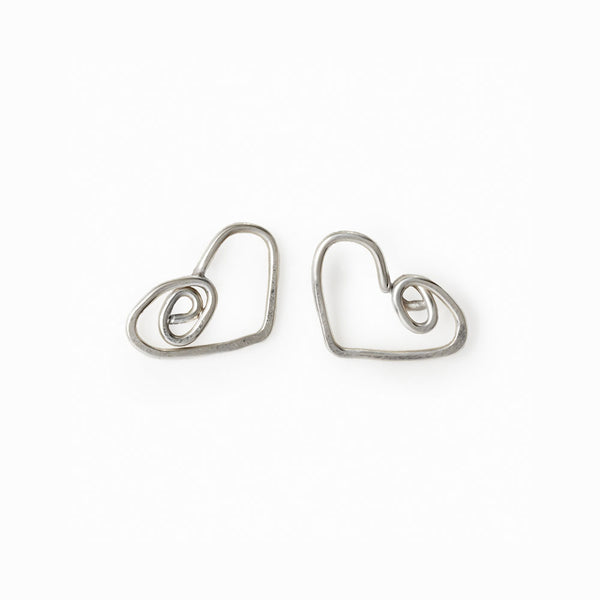 Silver Heart Stud Earrings by Elke Van Dyke – handcrafted sterling silver with minimalist sculptural shape and symbolic elegance.