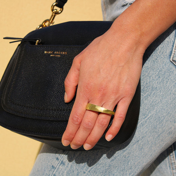 Elke Van Dyke's Gold Tsunami Ring—14K gold-plated over sterling silver with sculptural curves. Bold, wearable art .
