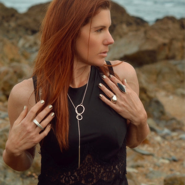 Elke Van Dyke Design mage of the Icicle Lariat Oxidized Necklace on a mannequin neck