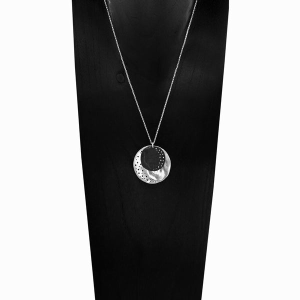 Silver Eclipse Pendant Necklace by Elke Van Dyke – handcrafted sterling silver with luminous crescent and oxidized moon design.
