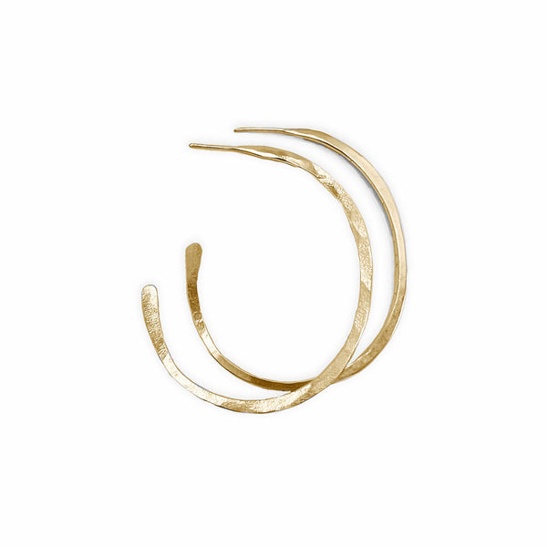 Gold Orbit Hoop Earrings by Elke Van Dyke are 14K gold fill sculptural hoops with undulating form. Available in 3 sizes.