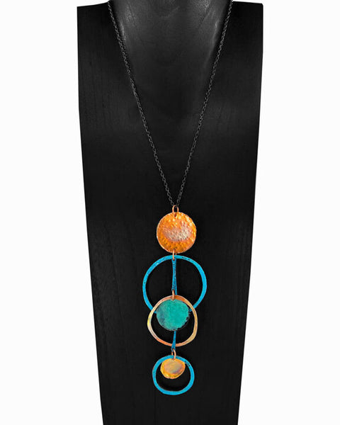 The Blue Hole Necklace by Elke Van Dyke Design. A turquoise and orange copper necklace displayed on a black mannequin, featuring a series of linked circles and pendants.