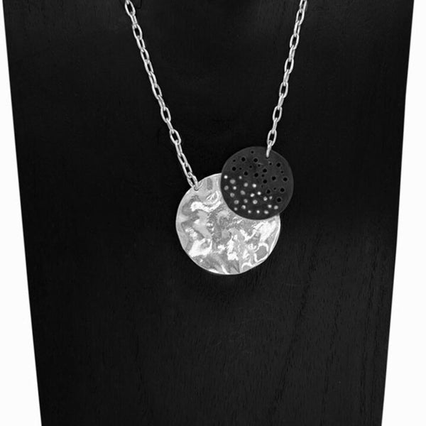 Retroshade Necklace by Elke Van Dyke – handcrafted sterling silver with luminous crescent and oxidized moon design.