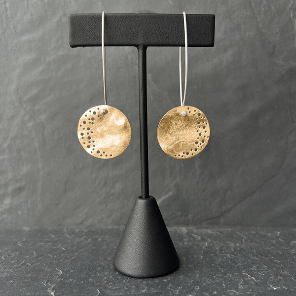 Gold Moon Dust Earrings - handcrafted 14K gold over sterling silver medallions with starlight perforations by Elke Van Dyke.
