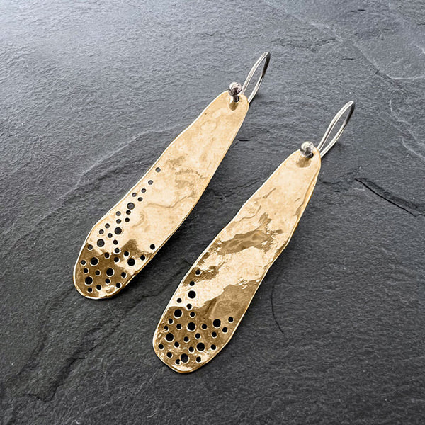 Gold Moon Dust Drop Earrings by Elke Van Dyke – handcrafted 14K gold over silver with high polish finish, inspired by lunar textures. Tear drop shape earring.