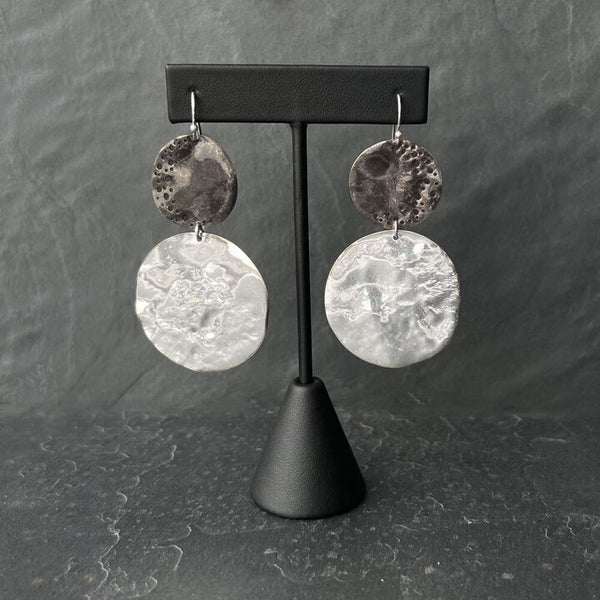 Penumbra Earrings - sterling silver and oxidized orbs on curved hooks. Sculptural lunar contrast by Elke Van Dyke.