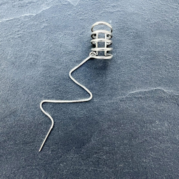 Quint Ear Cuff with Chain Thread by Elke Van Dyke—handcrafted sterling silver with a sleek cascading chain. A sculptural, modern statement for an elevated ear stack.