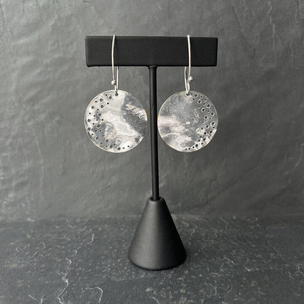 Elke Van Dyke's Silver Cresent Earrings – handcrafted high polish sterling silver inspired by celestial textures. 