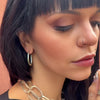 Video of Elke Van Dyke Design Sacred Bond Collection on model, handcrafted sterling oval silver chain link necklace, bracelet and earrings.