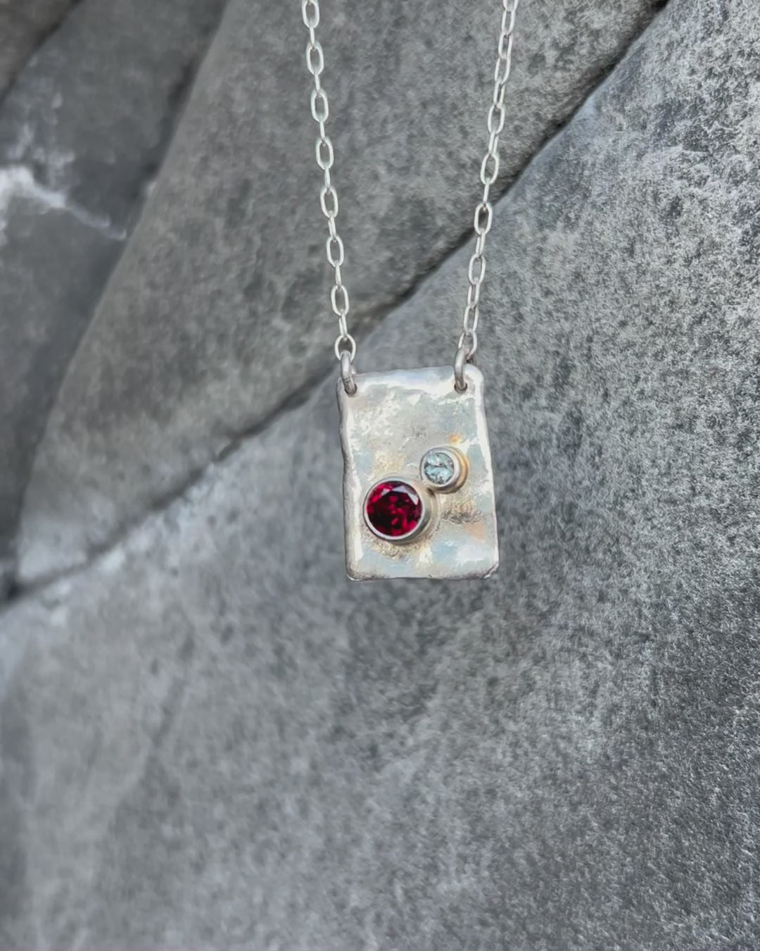 Handcrafted garnet and grey spinel necklace in sterling silver – unique artisan jewelry by Elke Van Dyke. One of a kind.