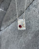 Handcrafted garnet and grey spinel necklace in sterling silver – unique artisan jewelry by Elke Van Dyke. One of a kind.