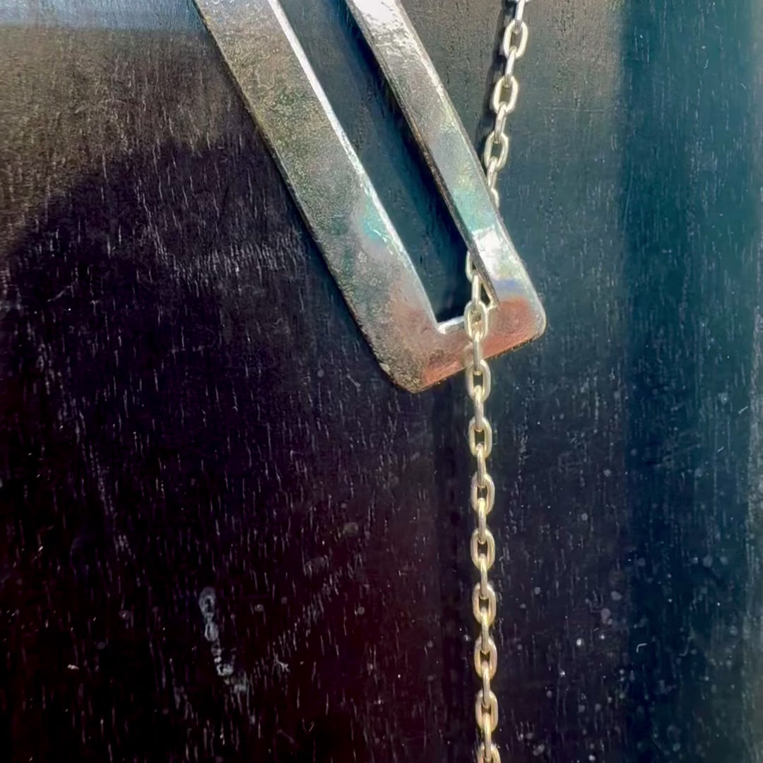 Core Lariat Necklace handcrafted in sterling silver with sculptural textured rectangular pendants by Elke Van Dyke Design.