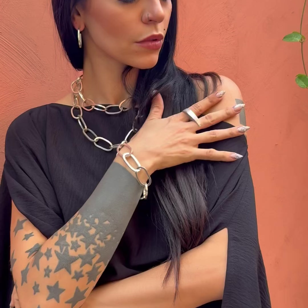 Video of Elke Van Dyke Design's Sacred Bond Necklace, Bracelet and Earrings handcrafted in sterling silver on model.