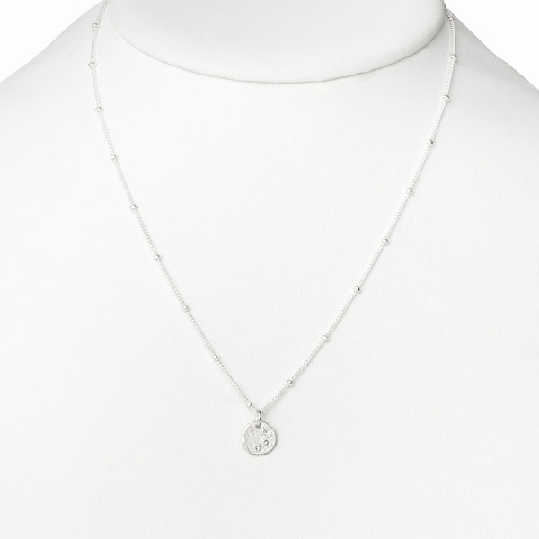 Elke Van Dyke Design Silver Three Wish Necklace on mannequin neck