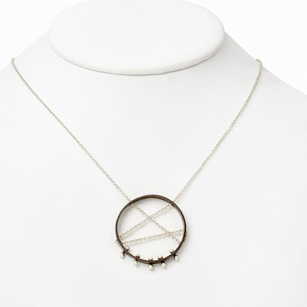 Elke Van Dyke Design Moonscape Pendant Necklace on mannequin neck