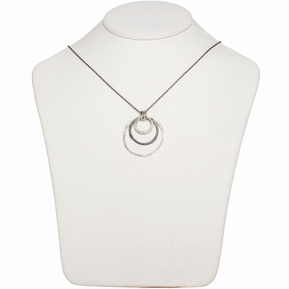 Elke Van Dyke Design Oxidized Trio Ring Necklace on mannequin neck