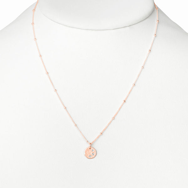Elke Van Dyke Design Rose Gold Three Wish Necklace on mannequin neck