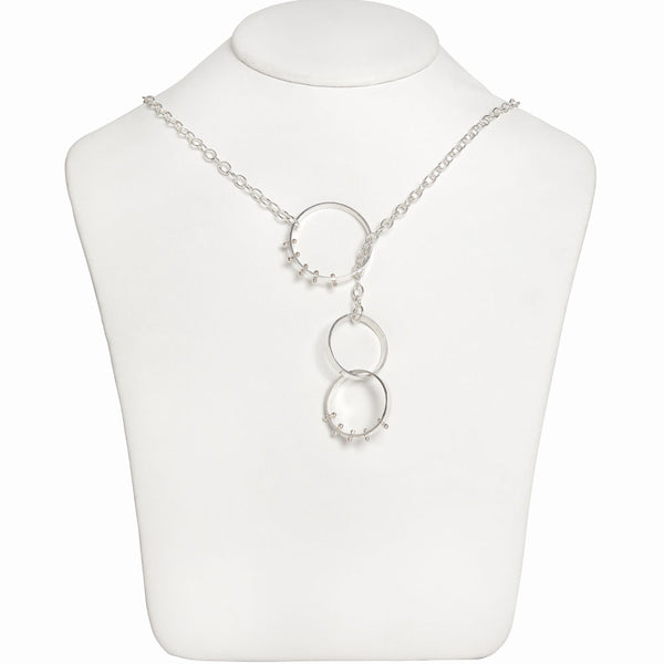 Elke Van Dyke Design Silver Moonscape Lariat Necklace on mannequin neck